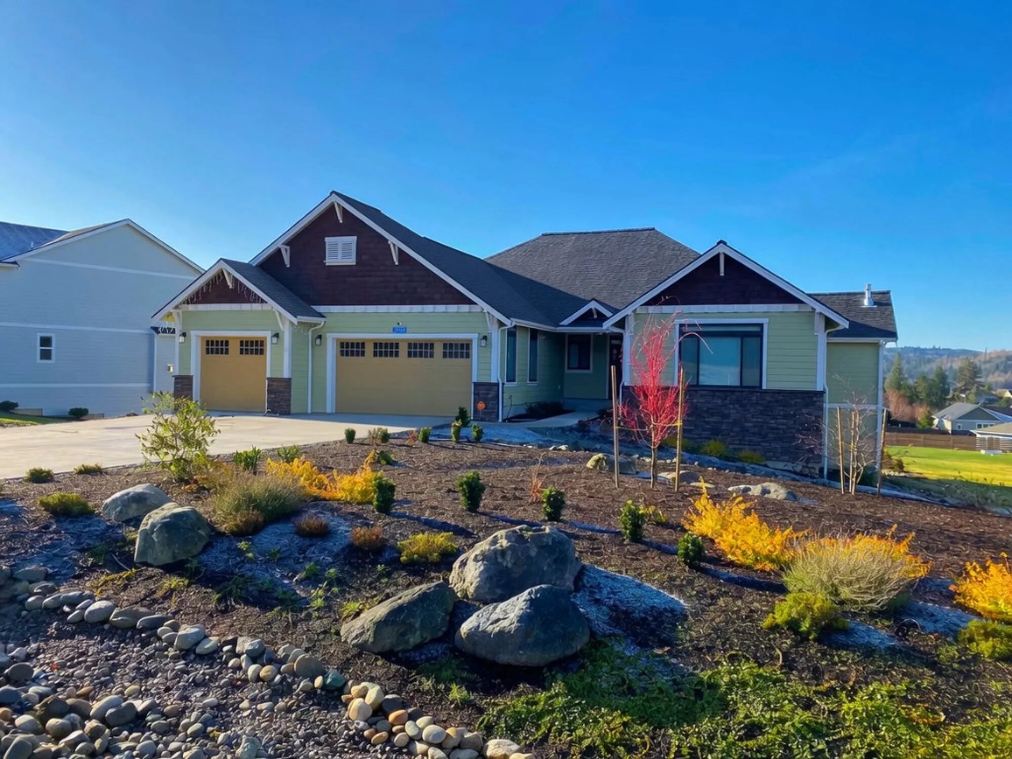 Nookachamp custom home with landscaped front yard in Anacortes, Washington