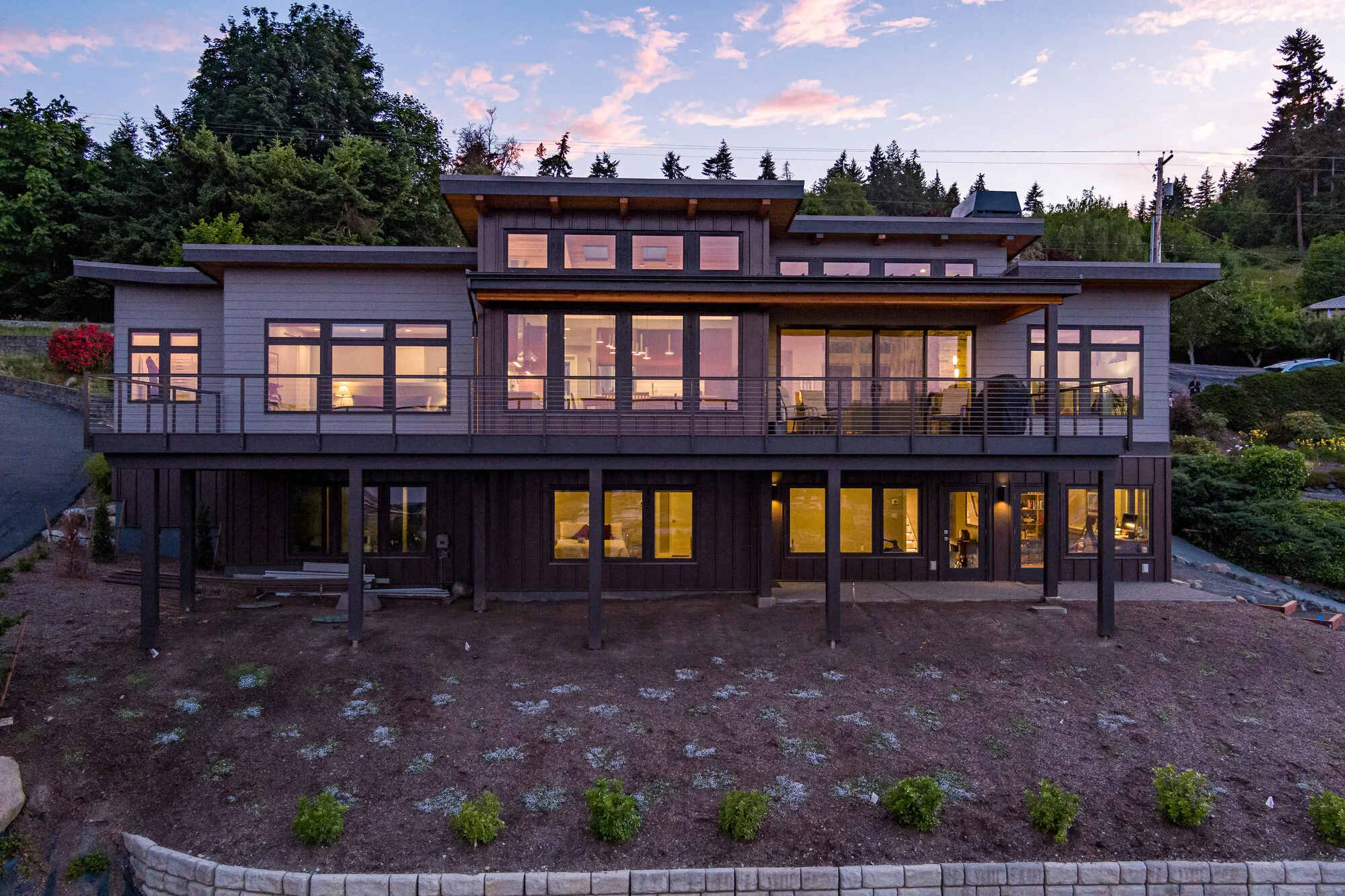 Interior living space with timber ceiling and water views